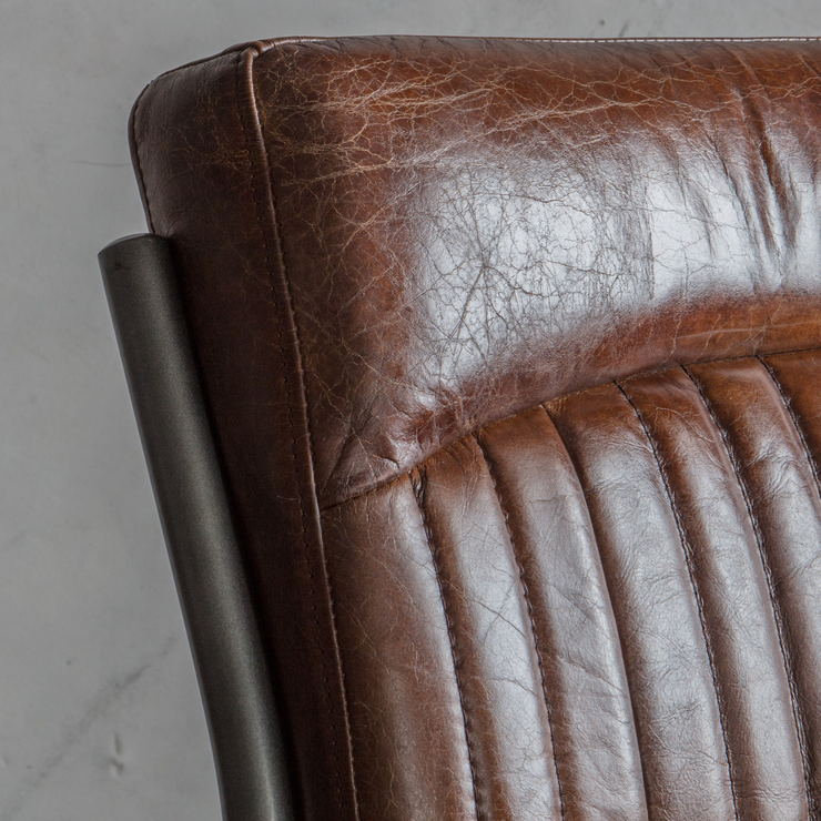 Ribbed leather store chair